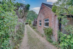 Rear Driveway Leading to Double Garage - click for photo gallery